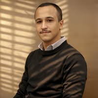 الكاتب